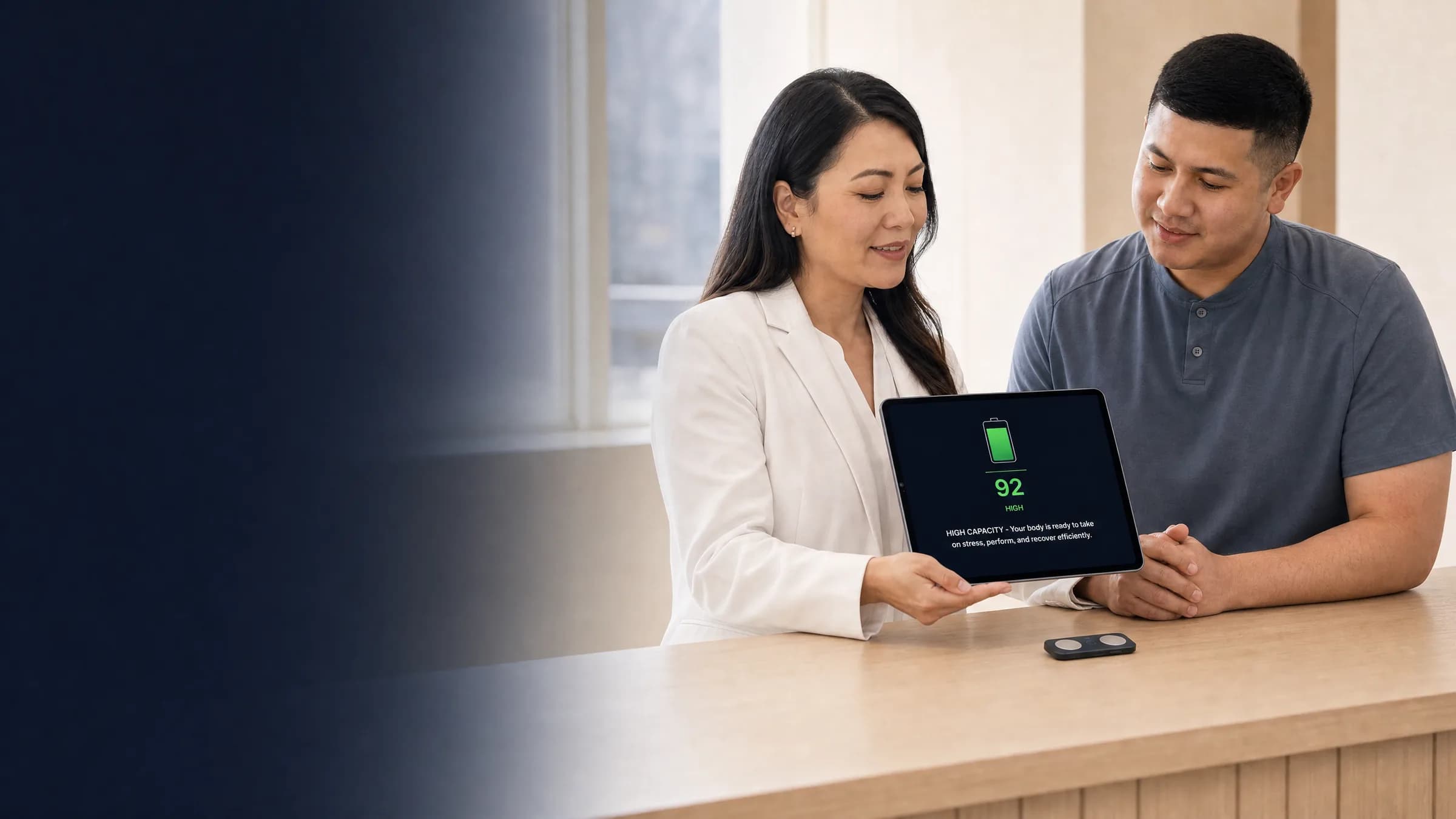 Clinician showing a ReadyOS readiness score to a patient